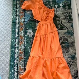 A Steve madden long dress. Off the shoulder and cut outs.